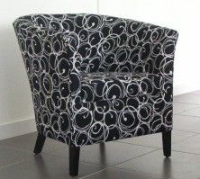 Ivana Single Tub Chair. Low Timber Leg Stained. Any Fabric Colour
